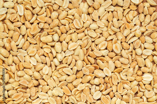  Roasted peanuts, salted snack. Peeled peanuts for background, top view.