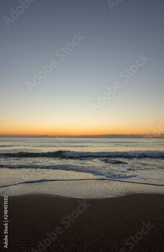 Fototapeta Naklejka Na Ścianę i Meble -  Sunrise on a beach of the mediterranean sea
