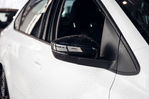 Side car mirror close-up. Details of luxury car. Car detail. Exterior detail