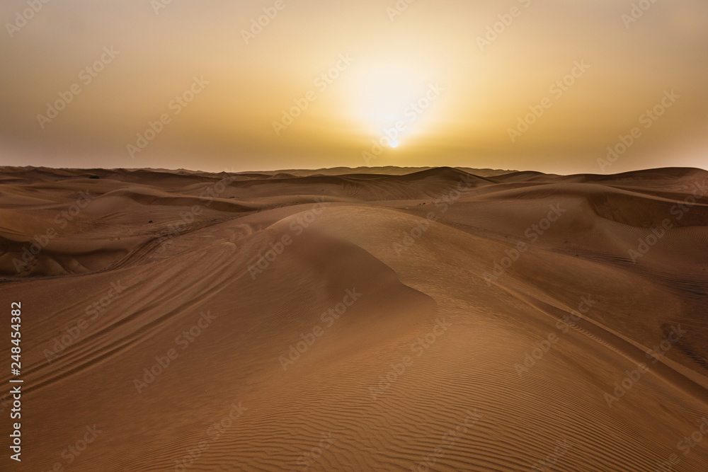 Sunset in desert in UAE, Sand dunes in United Arab Emirates