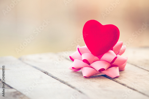 Red heart and pink ribbon St Valentine background