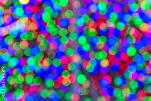 defocused Christmas lights on soft colors tone 