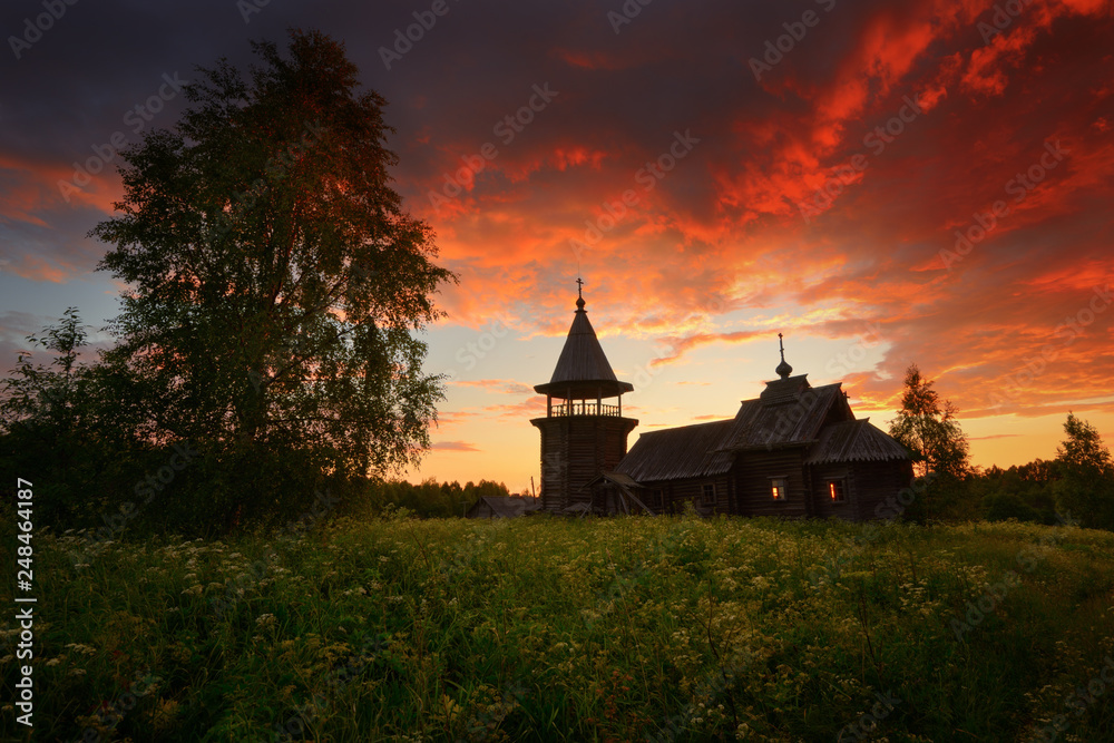 Old wooden church at sunset. Karelia, Zaonezhie, Russian North, Russia.
