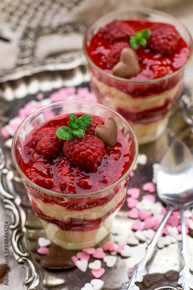Fruit layered dessert in verrines with raspberries and French custard pastry cream