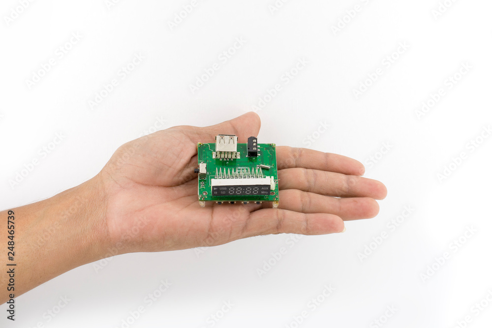 Hand holding IC chip Computer Graphics isolated on white Hand holding IC chip Computer Graphics isolated on white