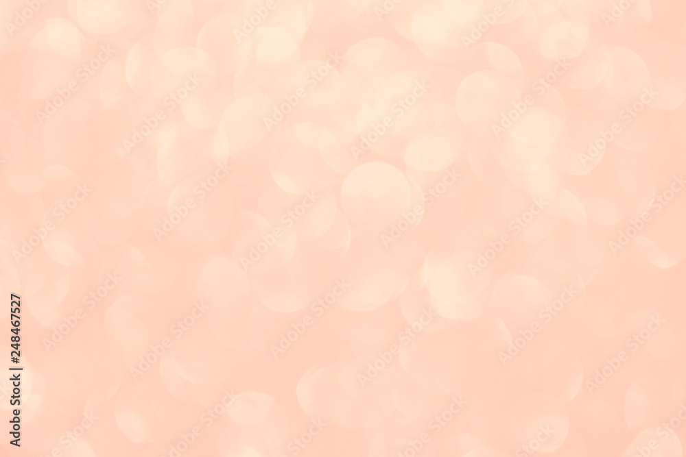 Coral blurry abstract background. Bokeh lights toned in trendy pastel color Coral blurry abstract background. Bokeh lights toned in trendy pastel color
