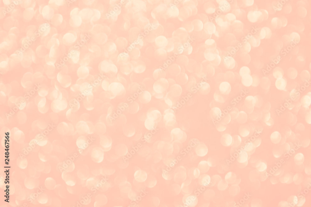 Coral blurry abstract background. Bokeh lights toned in trendy pastel color Coral blurry abstract background. Bokeh lights toned in trendy pastel color