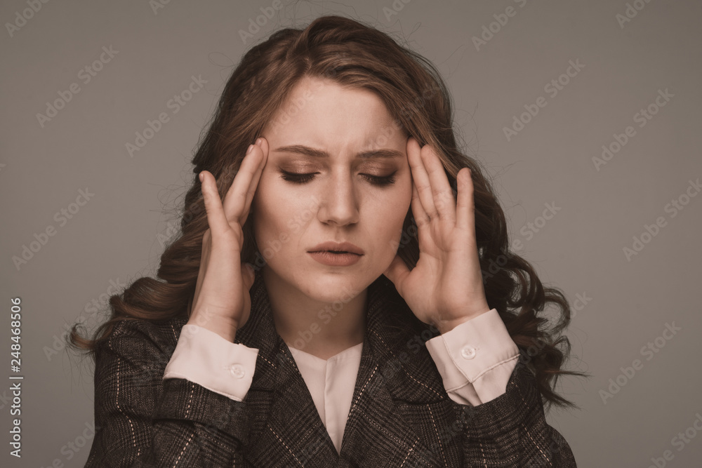 Health And Pain. Stressed Exhausted Young Woman Having Strong Tension Headache. Closeup Portrait Sick Girl Suffering From Head Migraine, Feeling Pressure And Stress. Health And Pain. Stressed Exhausted Young Woman Having Strong Tension Headache. Closeup Portrait Sick Girl Suffering From Head Migraine, Feeling Pressure And Stress.