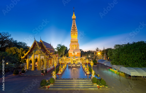 The Pagoda of Wat Phra That Panom temple in Nakhon Phanom, Thailand. Open the door to Wat Phra That Panom temple. Wat Phra That Phanom is the sacred precinct of the Phra That Phanom chedi.