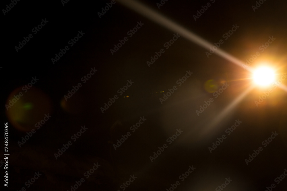 Abstract Natural Sun flare on the black background. Abstract Natural Sun flare on the black background.