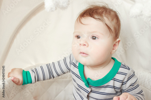 Portrait of joyfil, happiness baby in the bedroom, blurred background photo