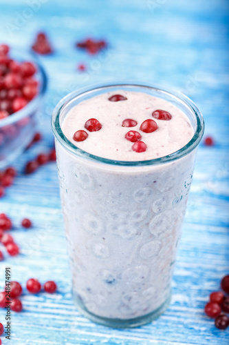 yogurt with cranberries on the table