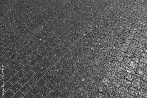 Tablou pe pânză pavement of dark gray cobblestone in perspective