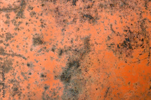 old rusty iron sheet covered with faded red paint © сергей тарануха