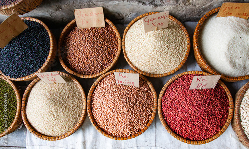 HANOI VIETNAM - AUGUST 2017: Various type of cereal grains (seeds, rice, buckwheat, oats, lentils,chickpeas, beans) on sale at Dong Xuan market