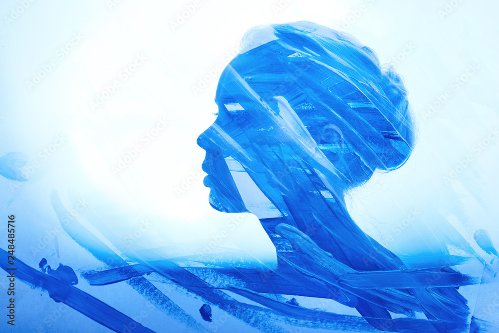 Art Portrait woman consisting of brush strokes of blue paint on a white ...
