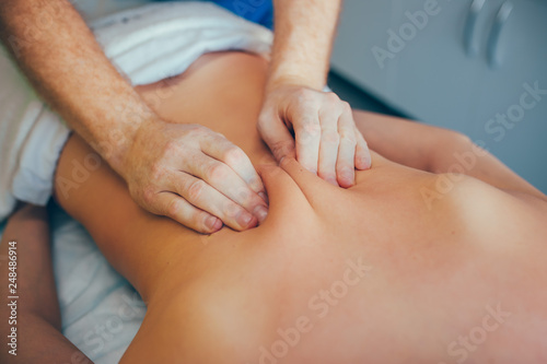 massage therapist making massage with two or four hands. Face massage. Herbal massage.