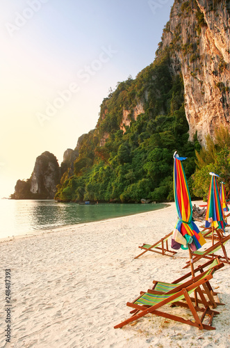 Sunchairs and umbrellas on Ao Ton Sai beach, Phi Phi Don Island, Krabi Province, Thailand photo