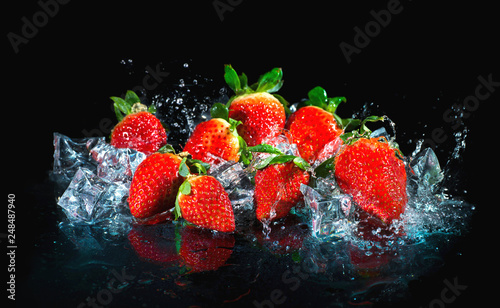 Strawberries in water splash