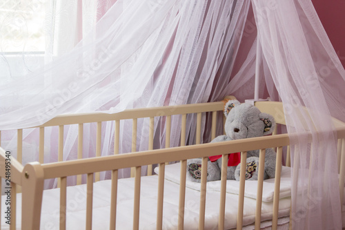 Fotografi baby bed with canopy,bedroom for the baby, cradle with a canopy