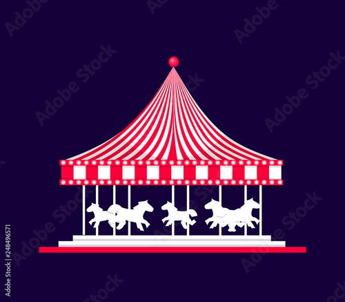 Striped red-white carousel with illumination Carnival on dark night background