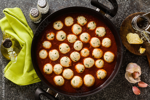 cheese veggie ricotta meatballs in tomato sauce in a pan. traditional Italian cuisine for the whole family, party or restaurant menu