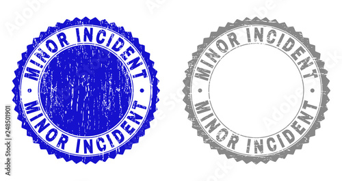 Grunge MINOR INCIDENT stamp seals isolated on a white background. Rosette seals with grunge texture in blue and grey colors. Vector rubber stamp imprint of MINOR INCIDENT tag inside round rosette.