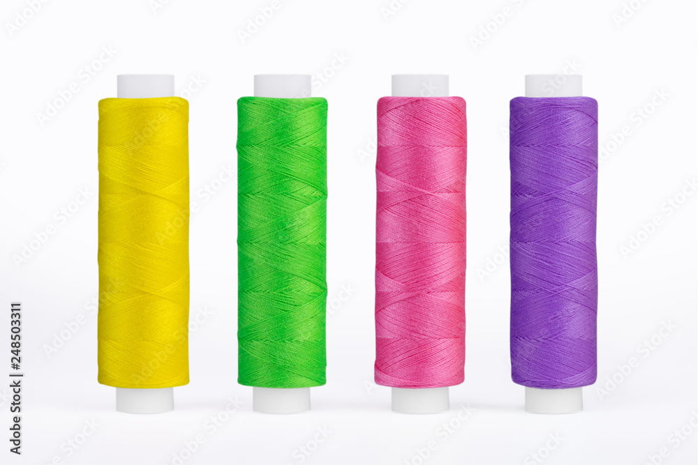 Set of sewing thread coils, miscellaneous colours, isolated on white Set of sewing thread coils, miscellaneous colours, isolated on white
