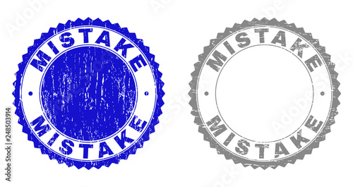 Grunge MISTAKE stamp seals isolated on a white background. Rosette seals with grunge texture in blue and grey colors. Vector rubber stamp imprint of MISTAKE caption inside round rosette.