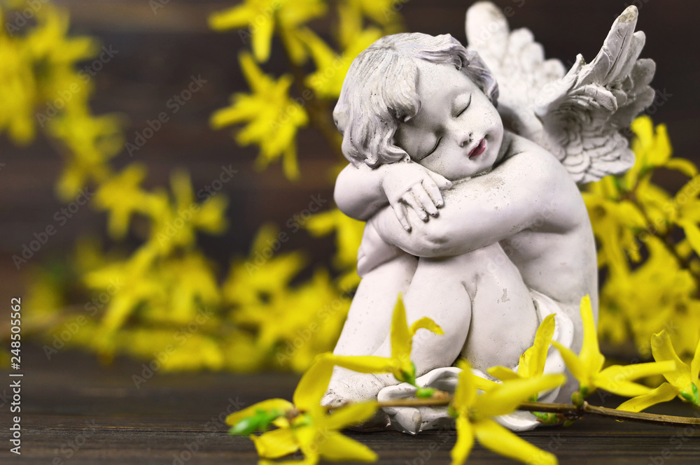 Condolence card with angel and yellow spring flowers Condolence card with angel and yellow spring flowers
