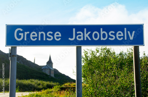 Place name sign on a road at Grense Jakobselv in northern Norway