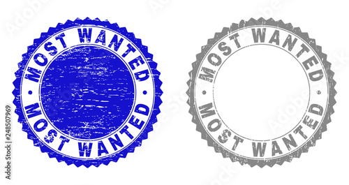 Grunge MOST WANTED stamp seals isolated on a white background. Rosette seals with distress texture in blue and grey colors. Vector rubber stamp imprint of MOST WANTED caption inside round rosette.