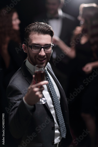 Elegant man with a champagne glass