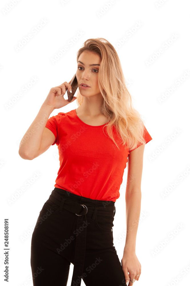 Beautiful young woman in red t shirt speak on a smart phone isolated over white background - phone chat Beautiful young woman in red t shirt speak on a smart phone isolated over white background - phone chat