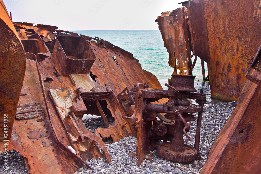 Old rusty pieces of scrap metal, parts of wrecked ship