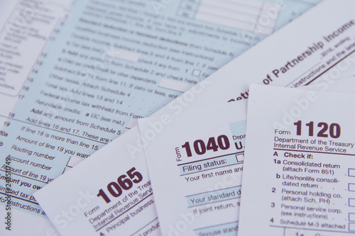 US tax form 1040, 1120, 1065 / taxation concept. USA