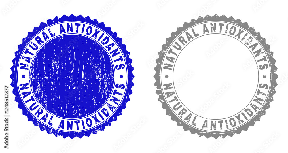 Grunge NATURAL ANTIOXIDANTS stamp seals isolated on a white background. Rosette seals with grunge texture in blue and gray colors. Grunge NATURAL ANTIOXIDANTS stamp seals isolated on a white background. Rosette seals with grunge texture in blue and gray colors.