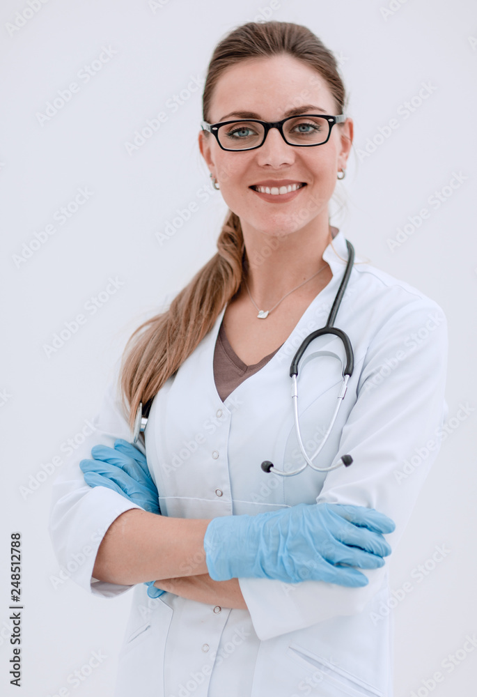 portrait of smiling female doctor on light background portrait of smiling female doctor on light background