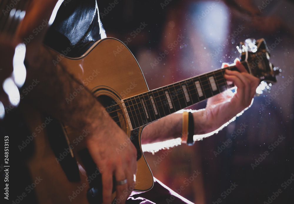 Fototapeta premium Playing classic guitar. Selective focus.