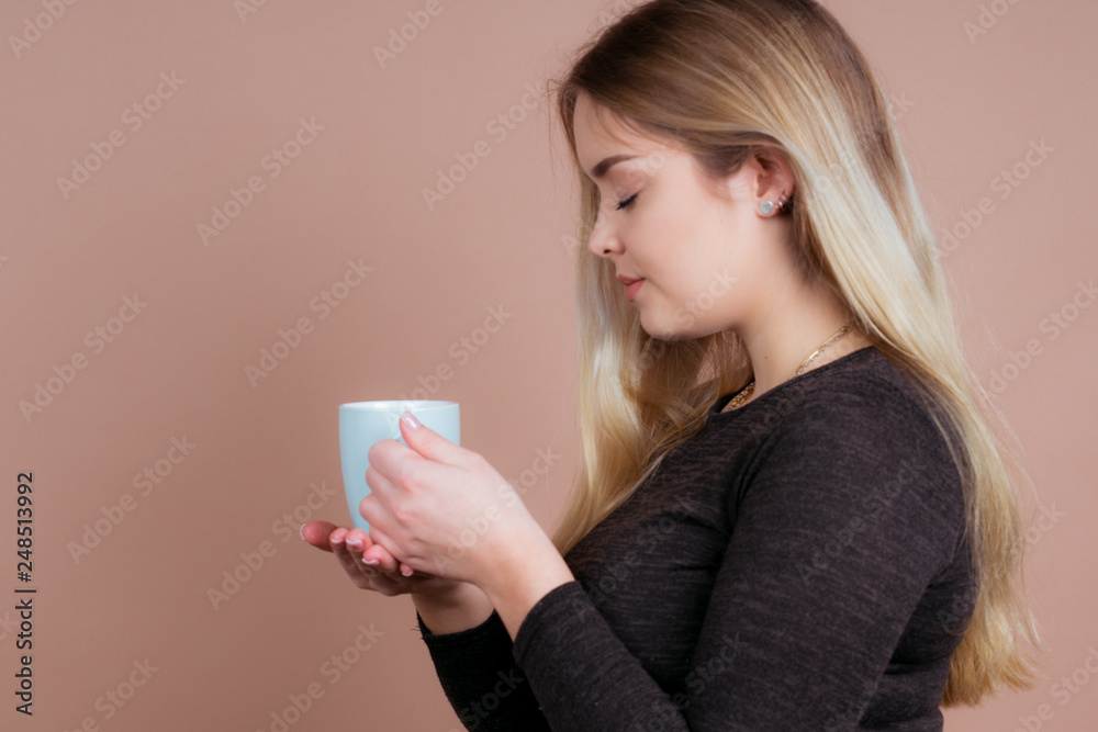 girl with a cup of tea and coffee girl with a cup of tea and coffee