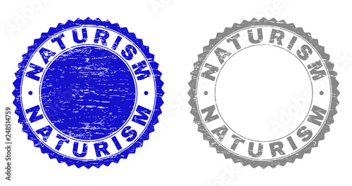 Grunge NATURISM watermarks isolated on a white background. Rosette seals with grunge texture in blue and gray colors. Vector rubber stamp imprint of NATURISM tag inside round rosette.