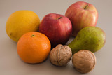 Fruits, apples, oranges, tangerines, pears, walnuts.