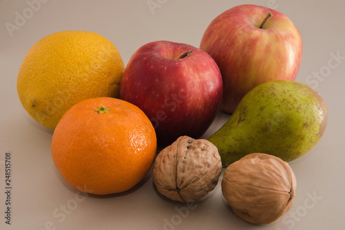 Fruits  apples  oranges  tangerines  pears  walnuts.