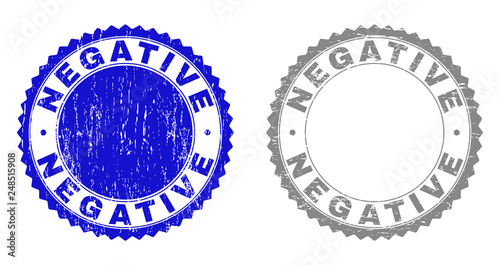 Grunge NEGATIVE stamp seals isolated on a white background. Rosette seals with grunge texture in blue and grey colors. Vector rubber stamp imprint of NEGATIVE tag inside round rosette.