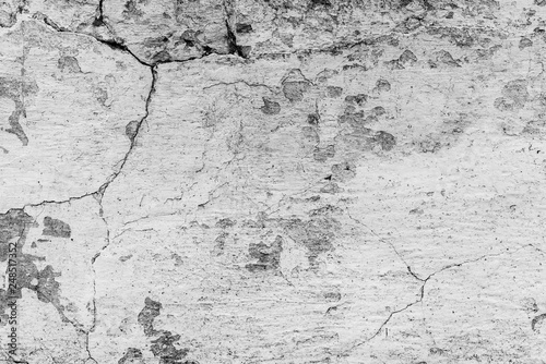 Texture, wall, concrete, it can be used as a background . Wall fragment with scratches and cracks © chernikovatv