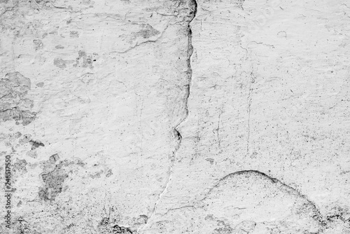 Texture  wall  concrete  it can be used as a background . Wall fragment with scratches and cracks