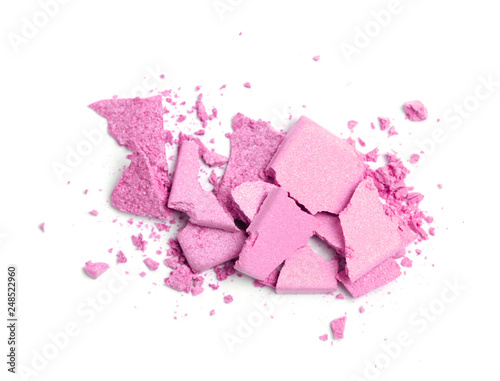 A broken pink eye shadow make up palette isolated on a white background. Top view, flat lay. Copy space for your text