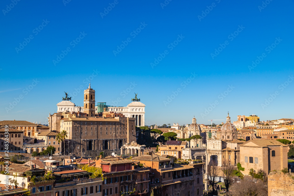 The cityscape skyline of Rome viewed from Palatine hill, Roman Forum, Italy