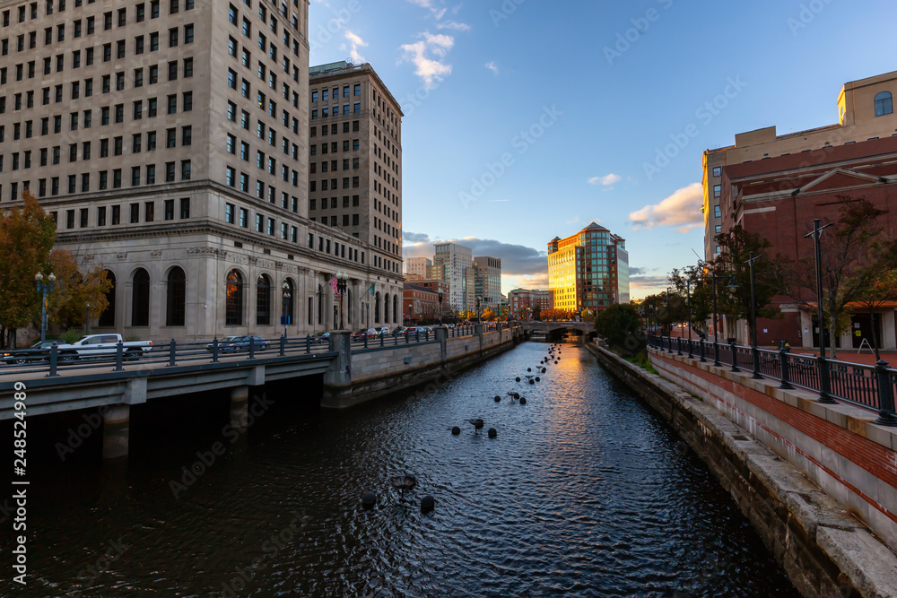 Providence, Rhode Island, United States - October 25, 2018: Scenic view of a beautiful modern downtown city during a vibrant sunset.