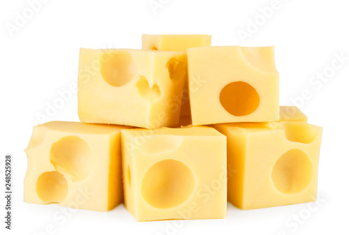 Heap of cheese cubes on a white, isolated.